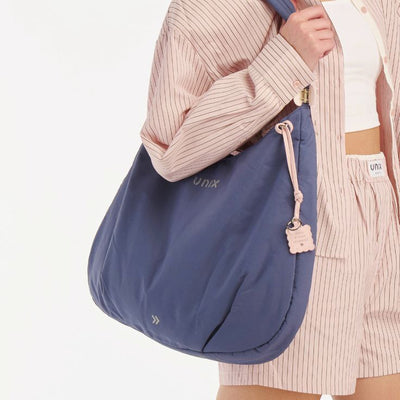 UNIX bag charm accessory premium minimalist design - UNIX | إكسسوار باج تشارم UNIX فاخر بتصميم بسيط وأنيق - UNIX