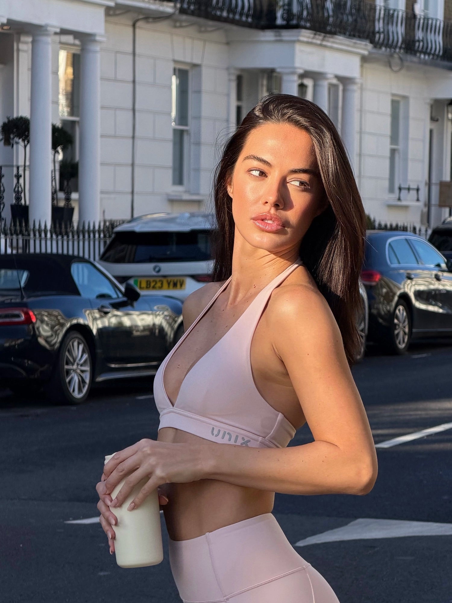 Whip pink bra top product photo women sportswear premium - UNIX | لقطة منتج توب برا بينك نسائي ملابس رياضية فاخرة وداعمة - UNIX