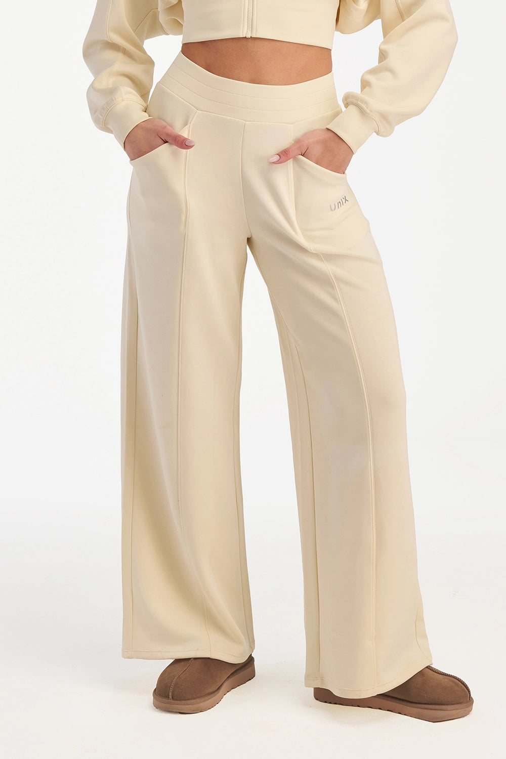 Off white waist tone wide leg pants women high waist - UNIX | بنطلون وايد ليج ويست تون أوف وايت نسائي بخصر عالي انسيابي - UNIX