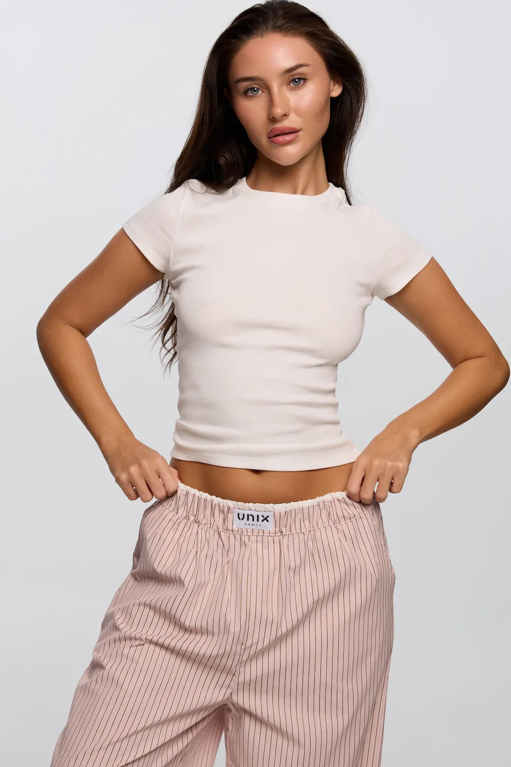 Women minimal beige top close up casual clean look - UNIX | توب نسائي بيج بإطلالة ناعمة وبسيطة لقطة قريبة ستايل كاجوال أنيق