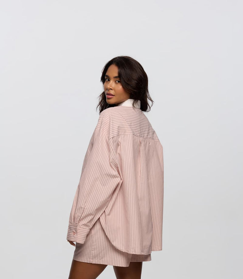 Women striped shirt back view relaxed lounge outfit - UNIX | قميص نسائي مخطط من الخلف بإطلالة مريحة وعصرية مناسبة للراحة اليومية