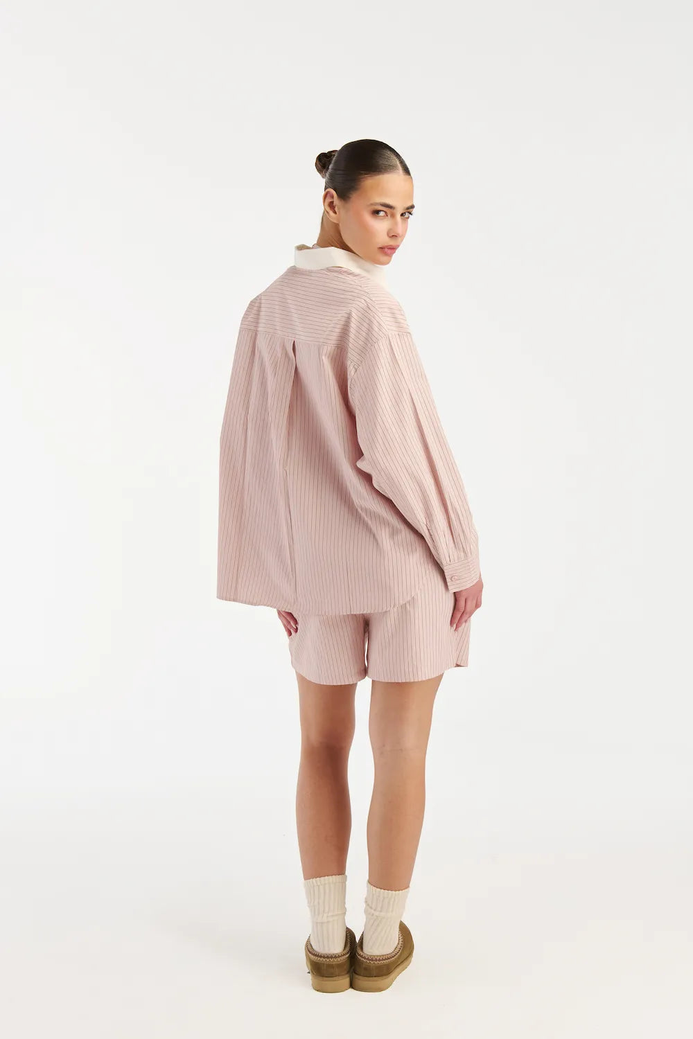 Women striped lounge shirt side view minimal comfy style - UNIX | قميص نسائي مخطط من الجانب تصميم بسيط ومريح لإطلالة يومية أنيقة
