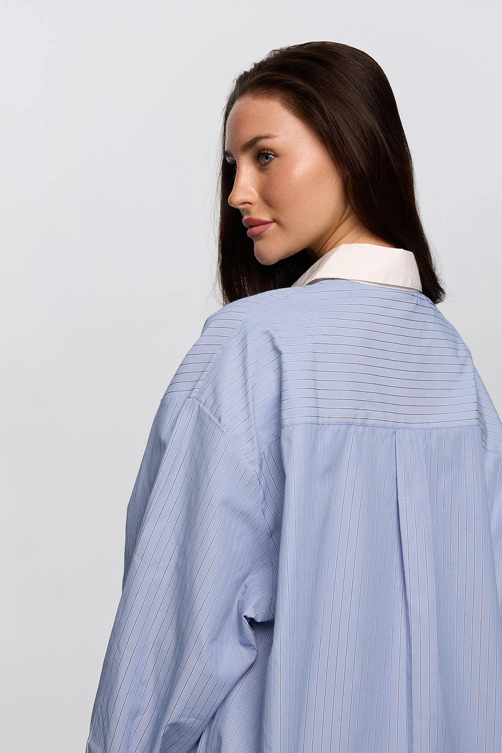 Sky blue boyfriend fit shirt women back view relaxed silhouette - UNIX | قميص نسائي بويفريند أزرق سماوي من الخلف بسيلويت مريحة - UNIX