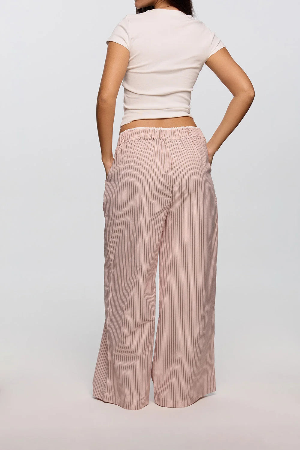 Pink lounge pants women back view relaxed wide leg fit - UNIX | بنطلون لاونج بينك نسائي من الخلف بقصة واسعة ومريحة - UNIX