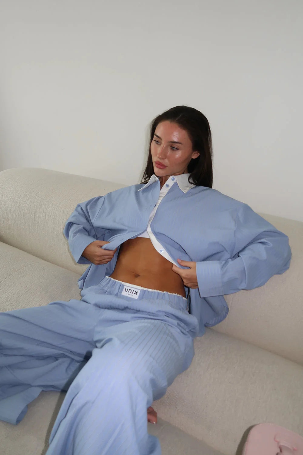 Women blue cotton shirt back view oversized comfortable fit - UNIX | قميص قطن نسائي أزرق من الخلف بقصة واسعة ومريحة فضفاضة - UNIX