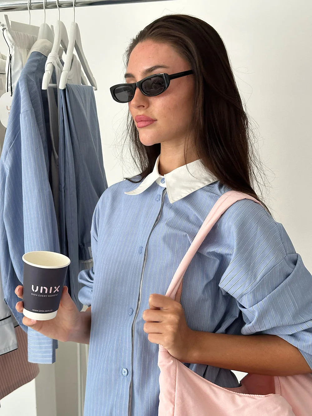 Sky blue shirt fabric detail close up soft breathable cotton - UNIX | تفاصيل قماش قميص أزرق سماوي لقطة قريبة قطن ناعم قابل للتنفس - UNIX