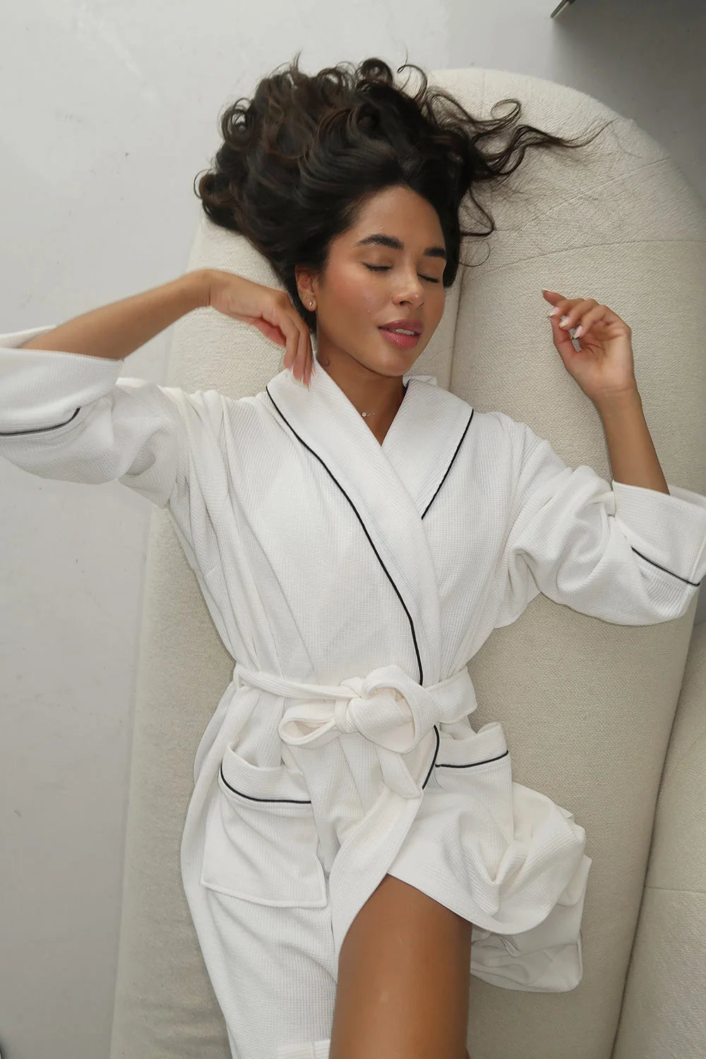 White robe fabric detail close up premium soft cotton - UNIX | تفاصيل قماش روب أبيض لقطة قريبة قطن فاخر وناعم الملمس - UNIX