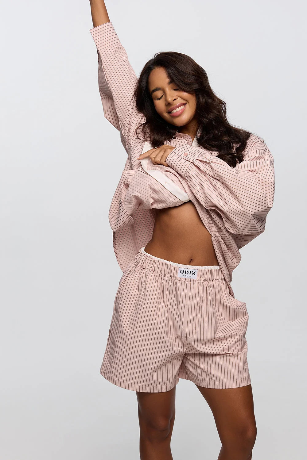 Whip pink lounge shorts set women styled outfit comfy chic - UNIX | طقم شورت لاونج بينك نسائي بإطلالة متكاملة مريحة وأنيقة - UNIX