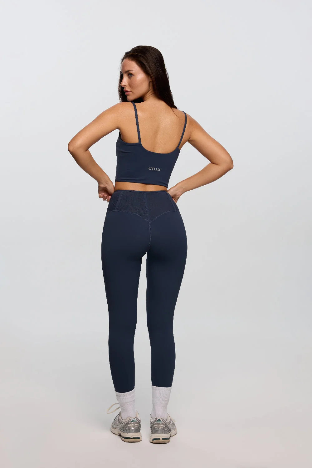 Midnight blue leggings side profile women body shaping fabric - UNIX | ليقنز كحلي نسائي من الجانب بقصة تبرز جمال الجسم بقماش فاخر - UNIX