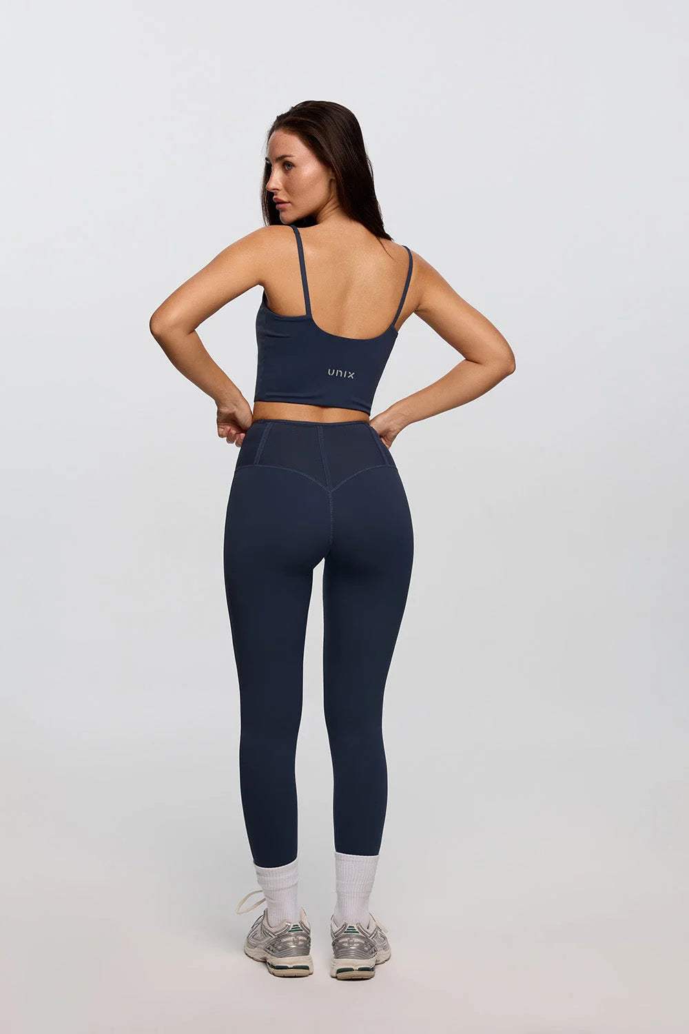 Navy blue activewear set women front view sculpting power fit - UNIX | طقم أكتيف وير كحلي نسائي من الأمام بقصة نحت قوية تبرز القوام - UNIX