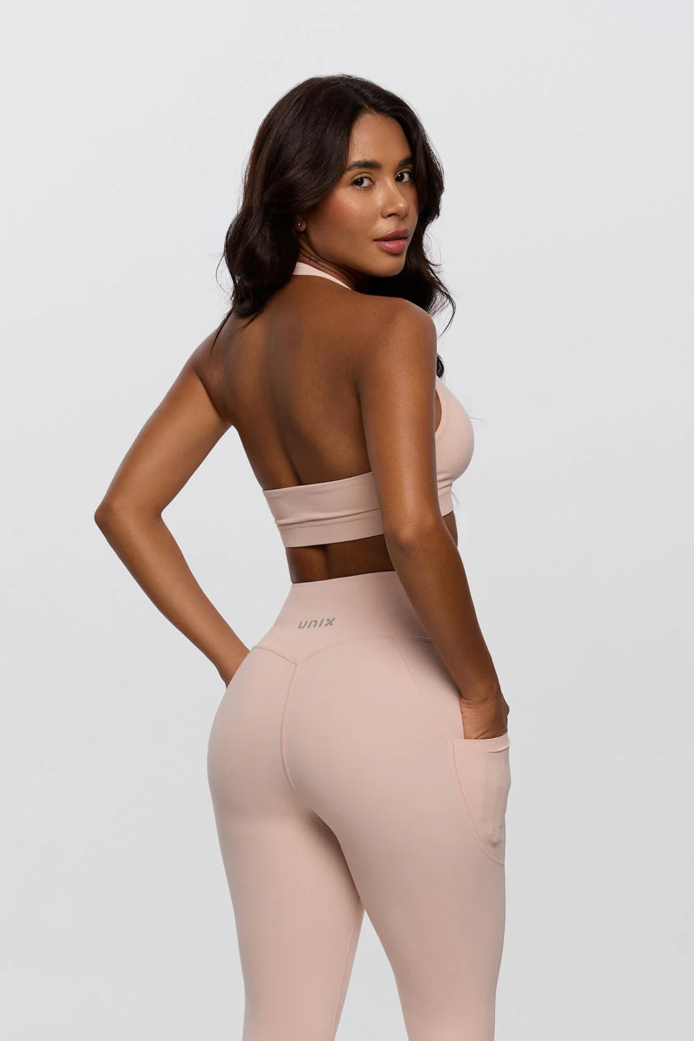 Pink halter bra top women deep neckline open back design - UNIX | توب برا نسائي بينك حلتر بياقة عميقة وظهر مفتوح تصميم جريء - UNIX