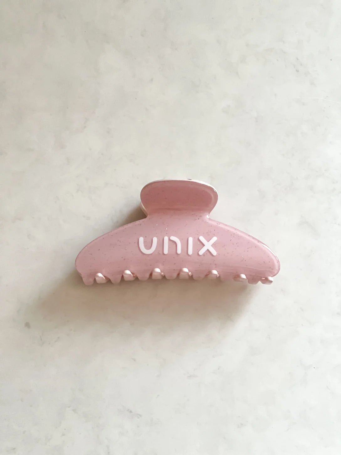 Powder pink hair clip back view sturdy grip elegant design - UNIX | مشبك شعر بينك باودر من الخلف بتركيب قوي وتصميم أنيق - UNIX