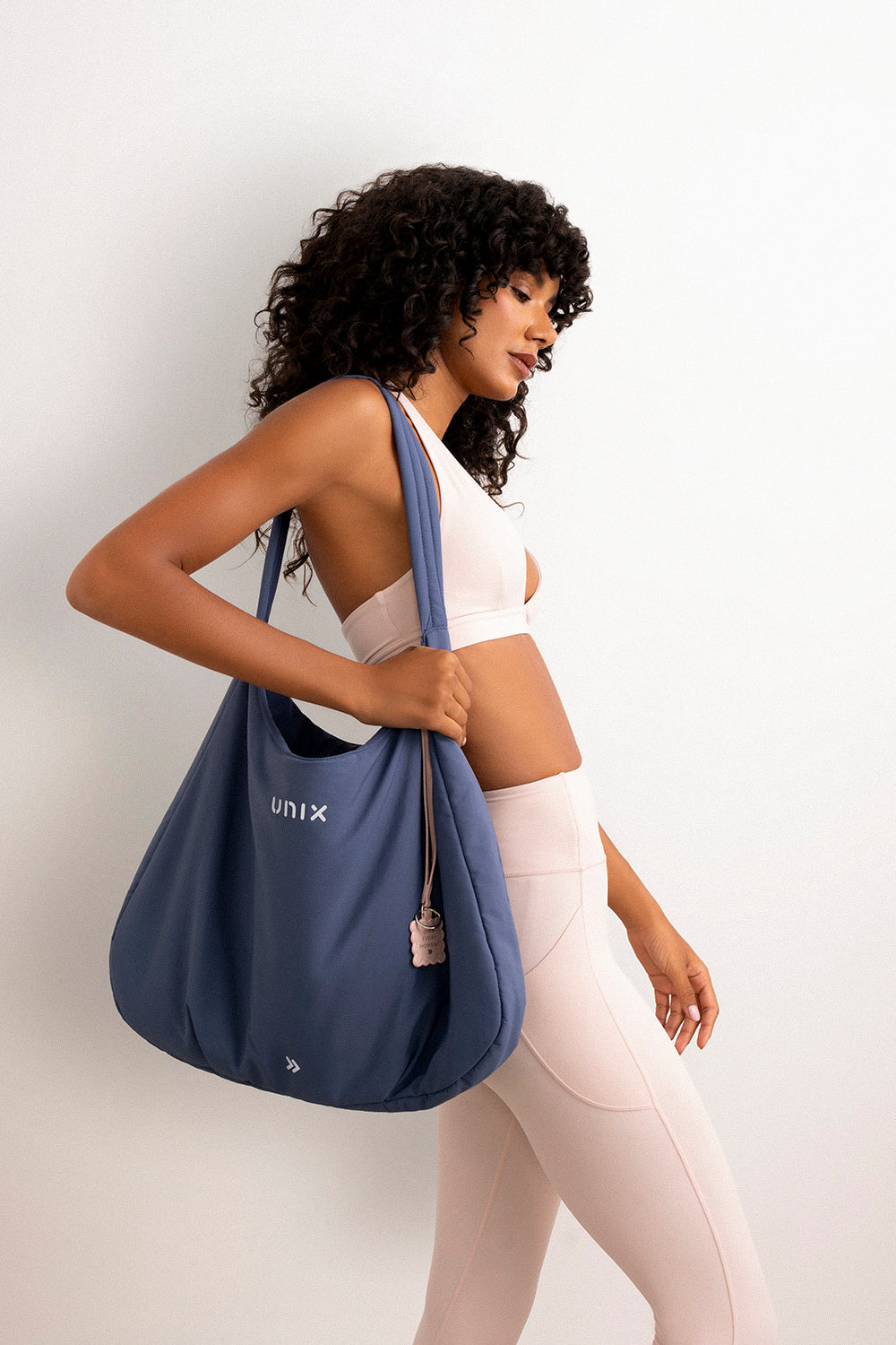 Timeless gym bag women charm keychain Own Every Moment - UNIX | حقيبة الجيم مع الميدالية المميزة Own Every Moment - UNIX