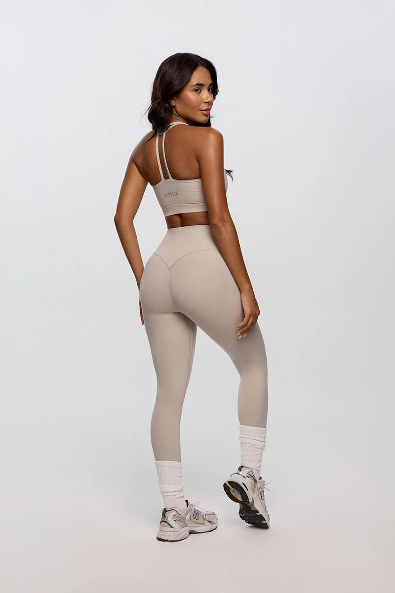 Cream women leggings front view sculpting activewear - UNIX | ليقنز نسائي بلون الكريمي من الأمام يبرز الجسم أكتيف وير راقي - UNIX
