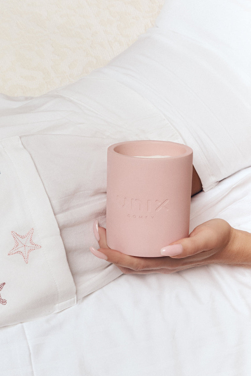 Sheer candle powder pink vessel soft minimal finish - UNIX | شمعة شير بلون بودر بينك بتصميم ناعم وبسيط - UNIX
