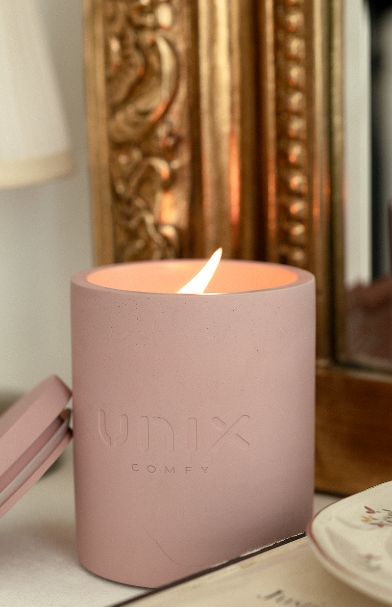 Sheer candle lit soft morning light floral notes - UNIX | شمعة شير مشتعلة بضوء الصباح الناعم ولمسات زهرية - UNIX